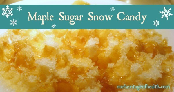 bowl of snow with boiled maple syrup drizzled over it