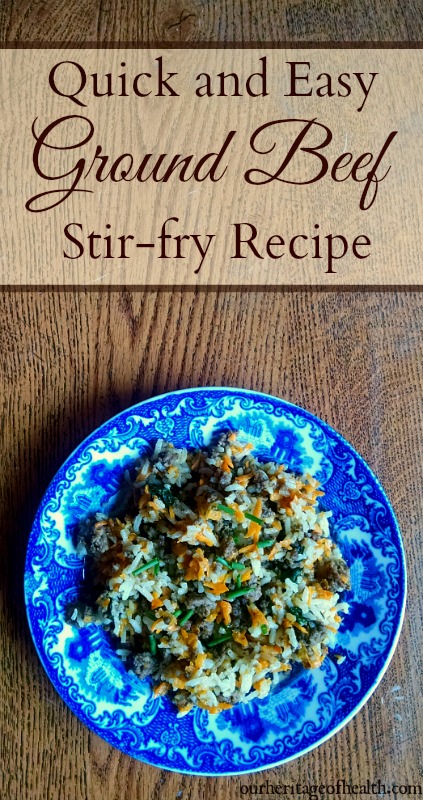 Ground beef stir fry on blue plate on table